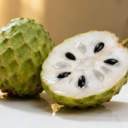 A fresh cherimoya fruit, whole and halved, showcasing its creamy white flesh and glossy black seeds.
