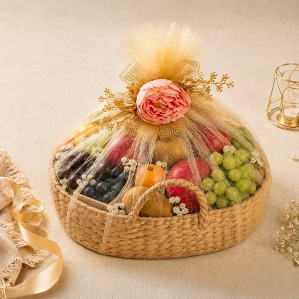 Luxury Gift Hamper Mumbai featuring an elegant woven fruit basket filled with premium fresh fruits and floral decoration.